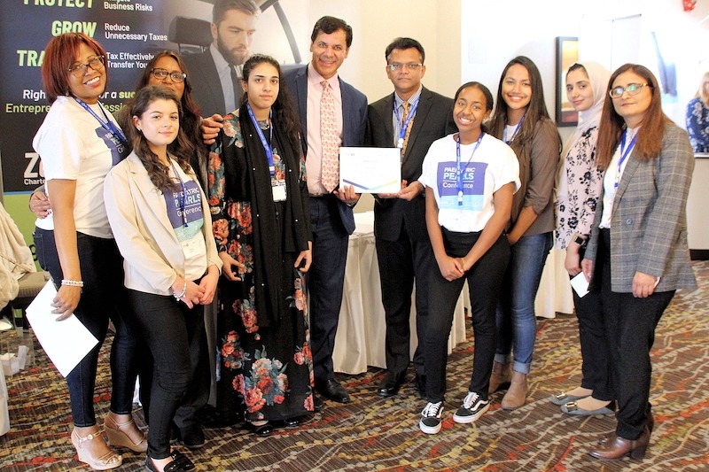 Dr. Hamid presenting a certificate to participants