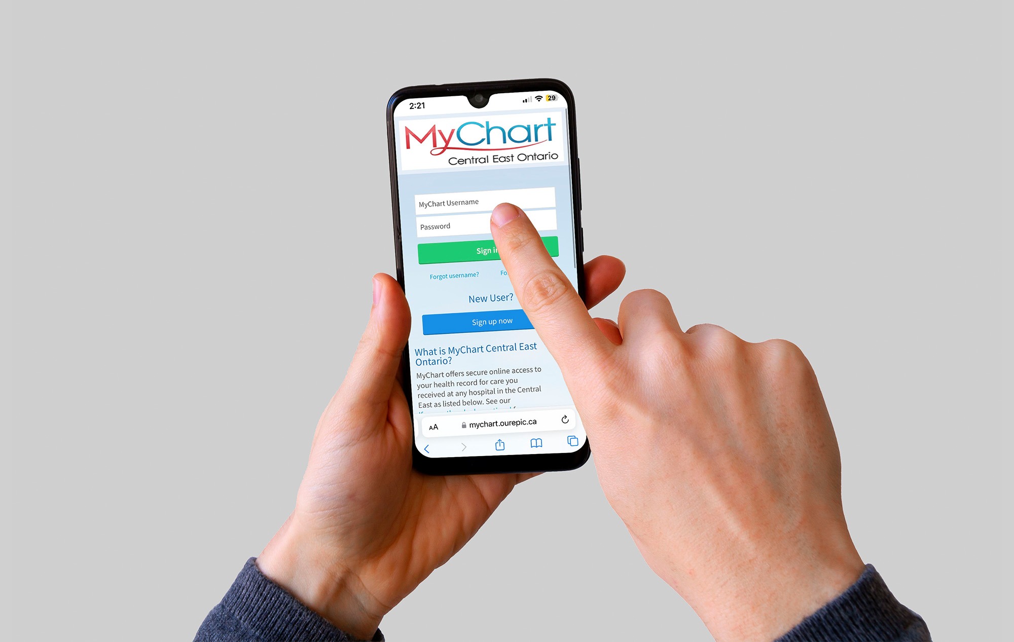 A person's hands using MyChart on their mobile device